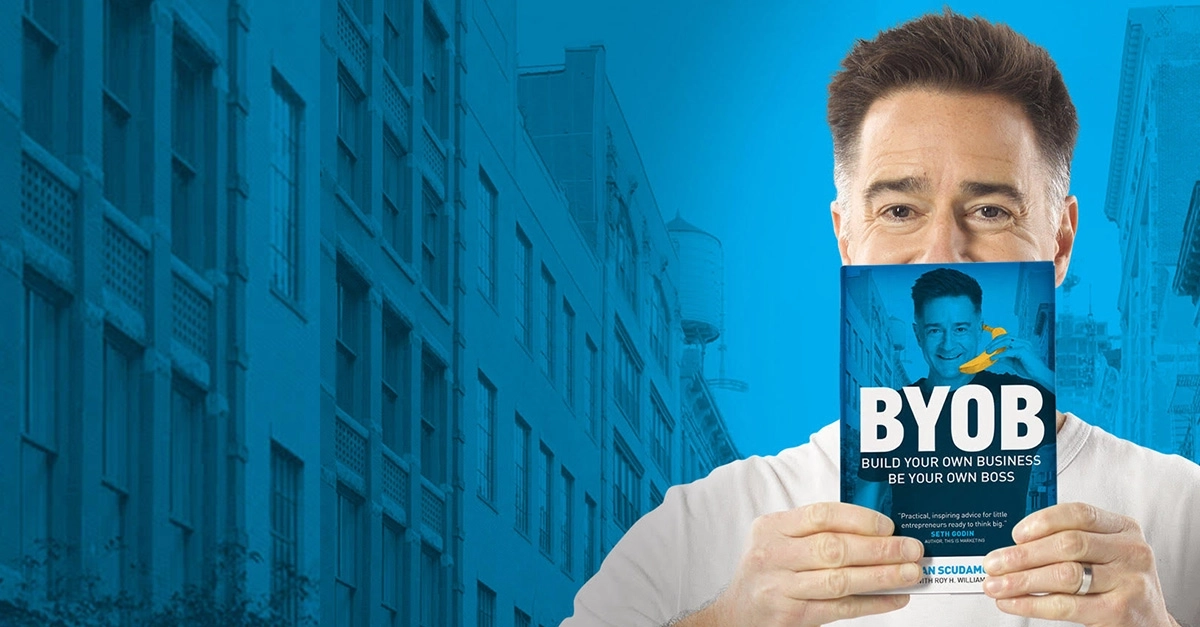 Brian holding BYOB book image